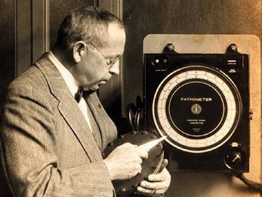 Herbert Grove Dorsey with the Dorsey Fathometer, an early acoustic echo-sounding device used to map the ocean floor, circa 1930