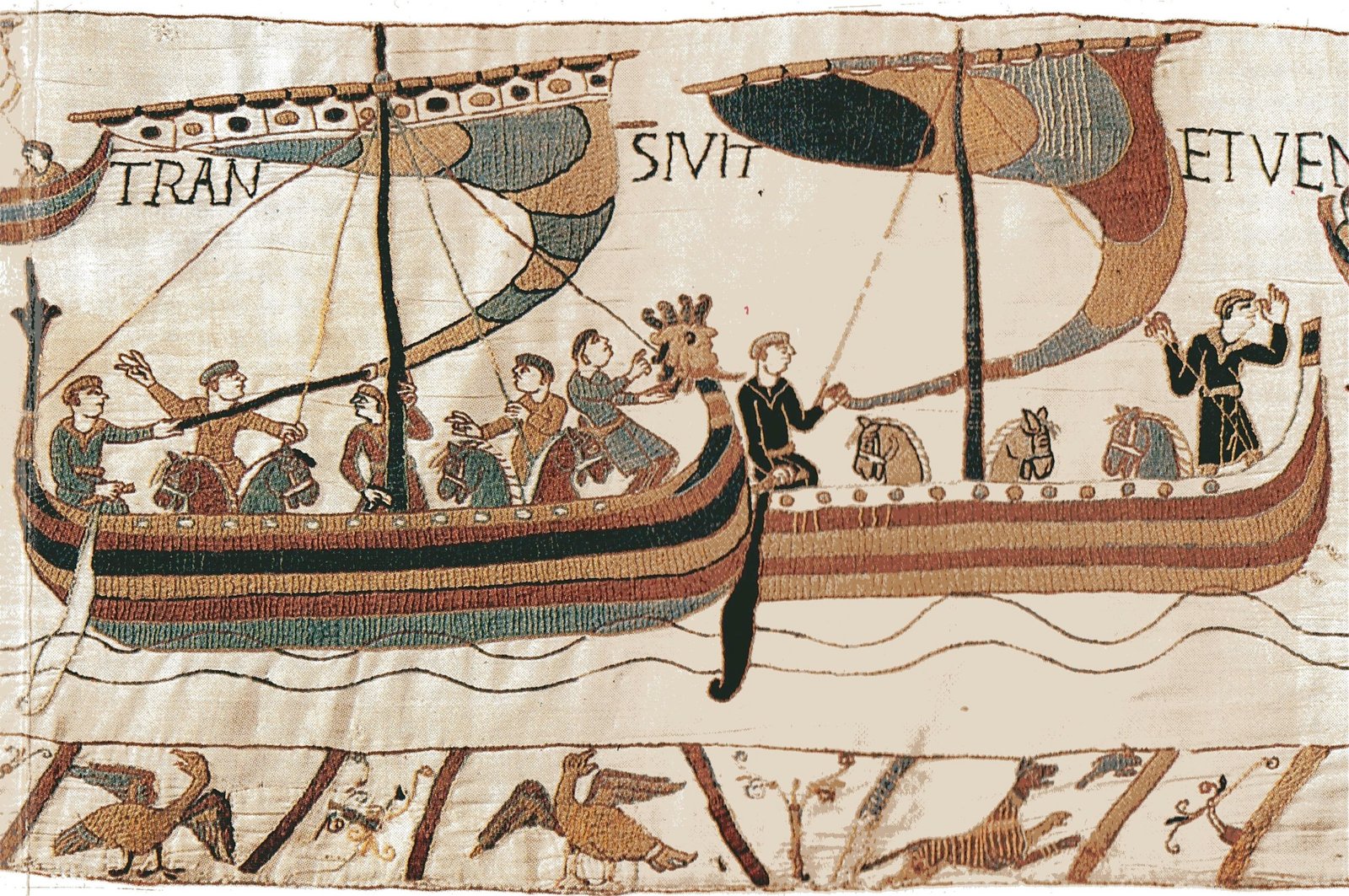 Detail from the Bayeux Tapestry showing Norman horses and supplies being loaded onto ships before the 1066 crossing to England.