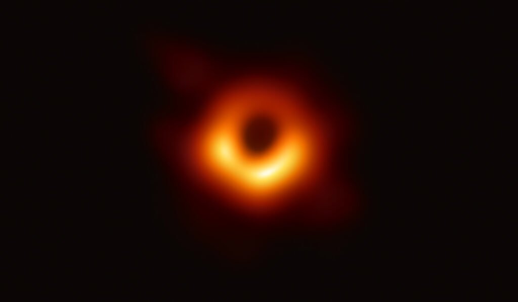 The first-ever image of a black hole, showing the glowing ring around the supermassive black hole at the center of galaxy M87