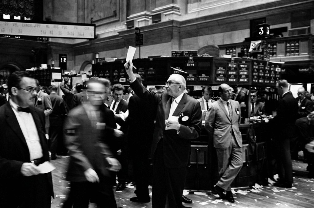 Traders on the floor of the New York Stock Exchange, where buy and sell orders for listed companies are matched into public share prices.