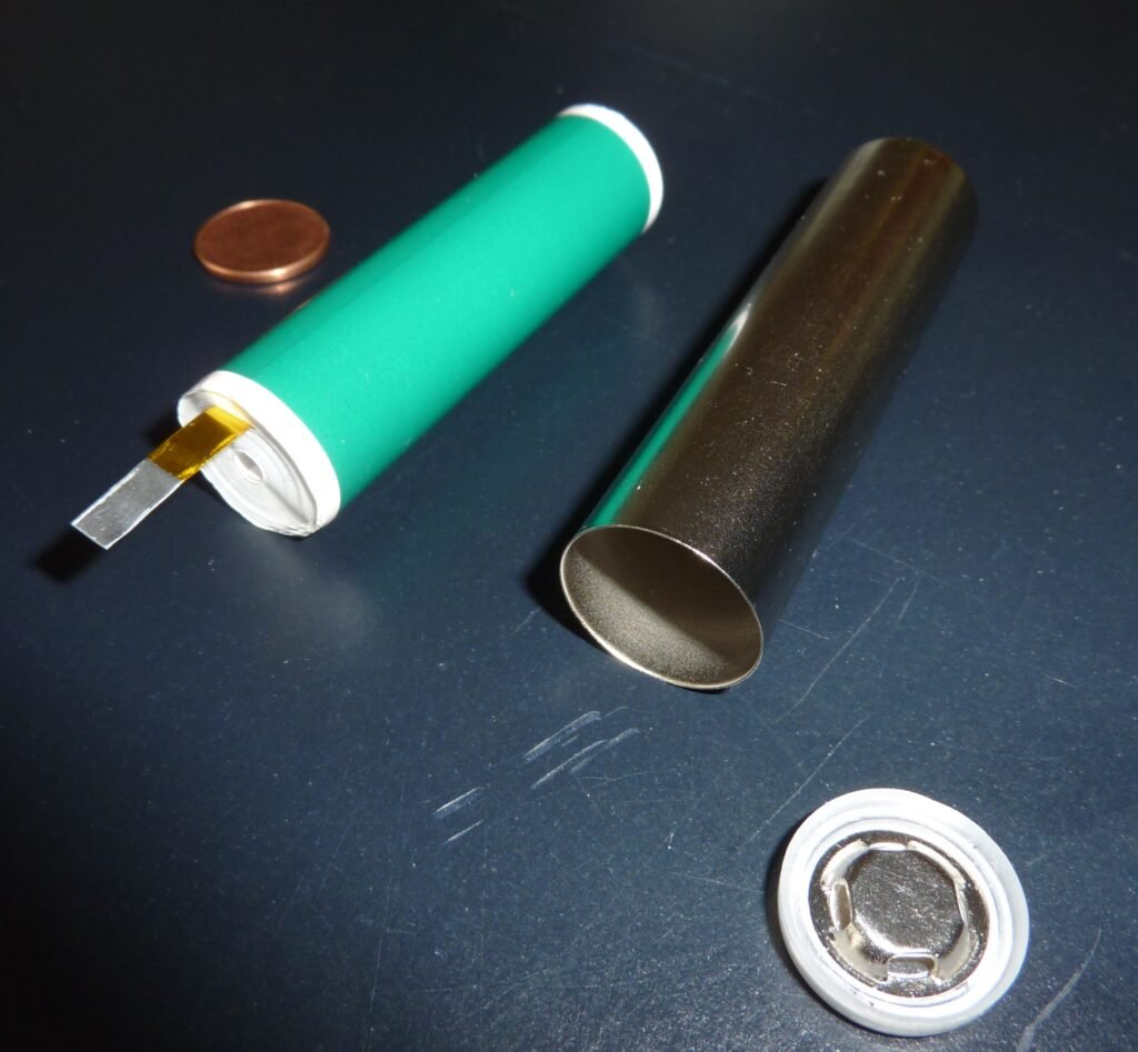 A cylindrical lithium-ion battery cell like the ones wired together by the thousands to build an electric car battery pack.