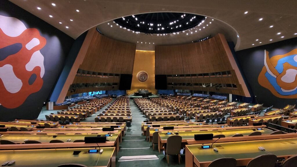 The General Assembly hall at United Nations Headquarters in New York, seen from the rear of the chamber.