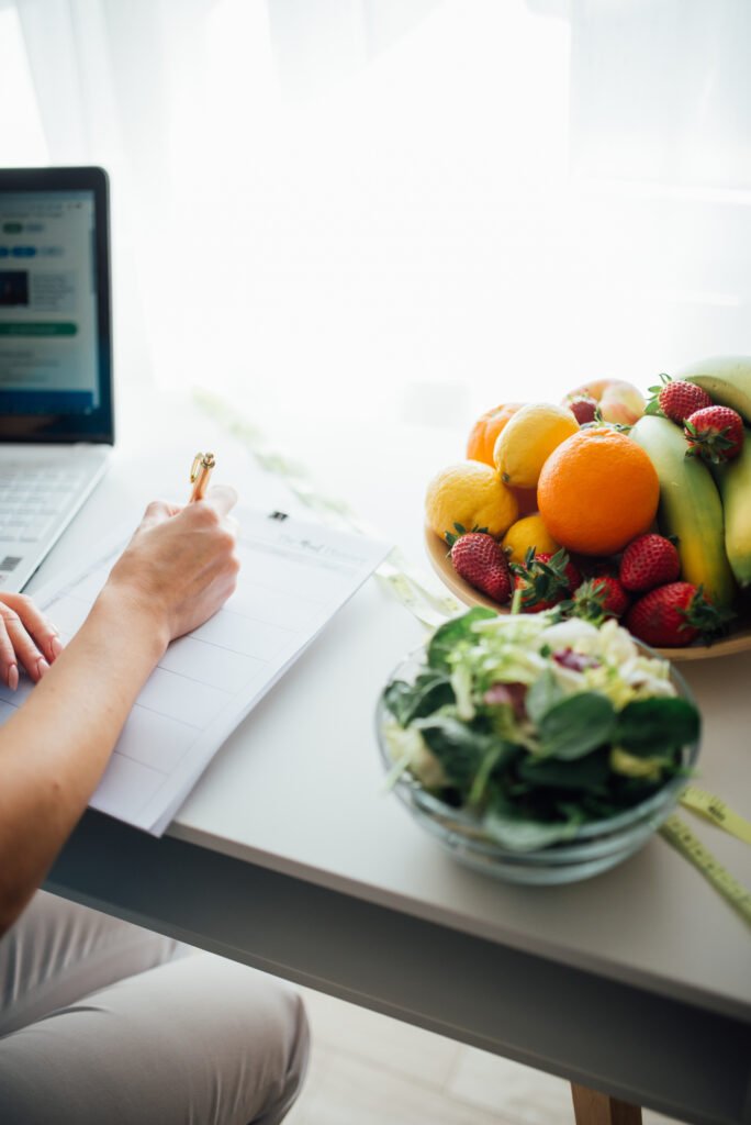 Fresh fruits and vegetables laid out for healthy meal planning, relevant to eating-window based diets like intermittent fasting.