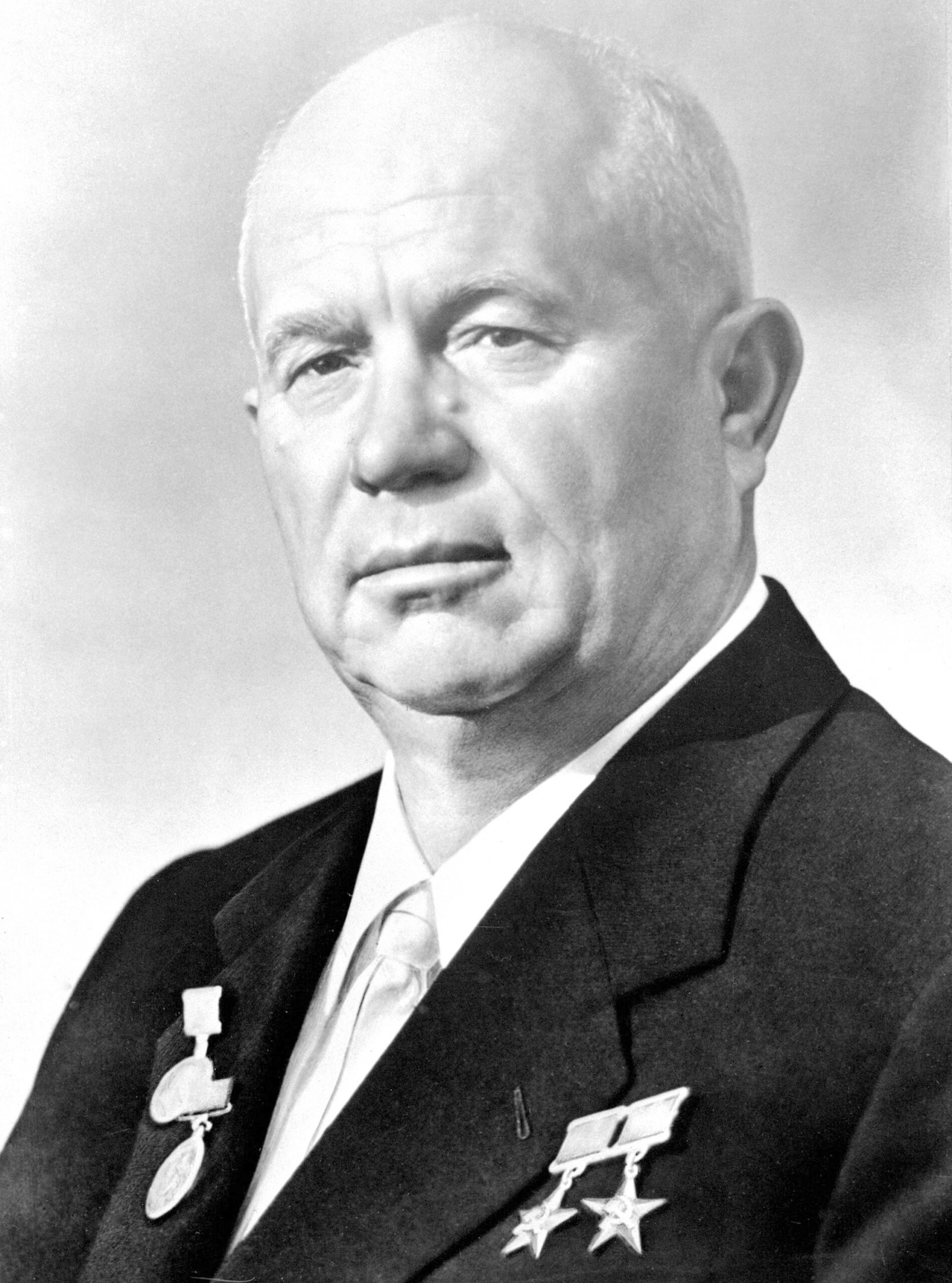 Black-and-white official portrait photograph of Soviet Premier Nikita Khrushchev.
