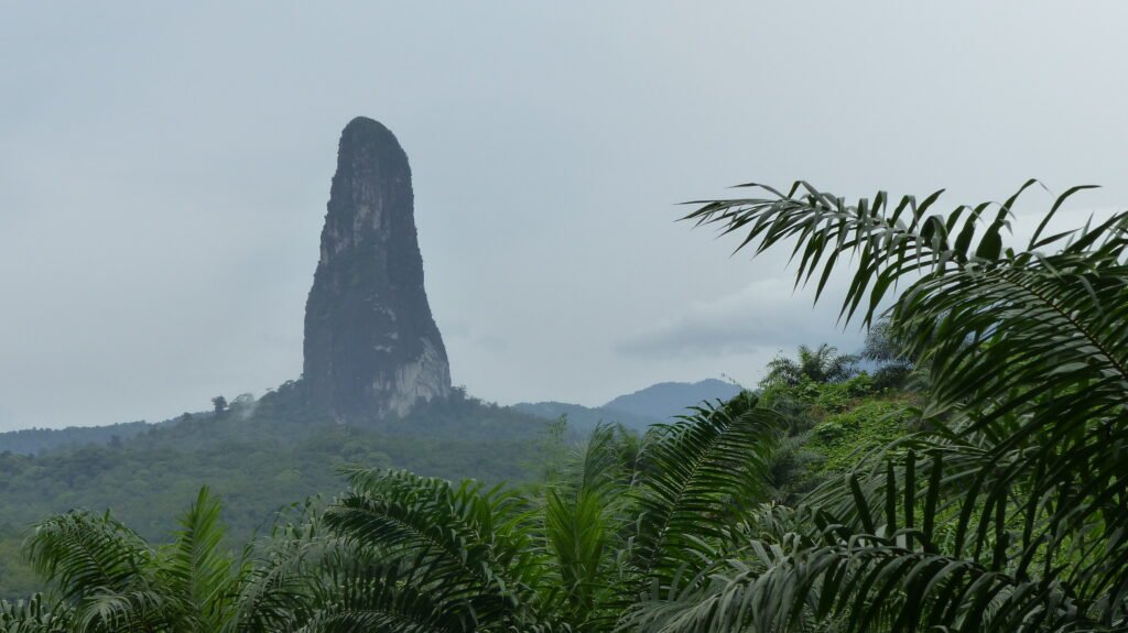 Pico Cao Grande, the iconic volcanic spire rising from the rainforest on Sao Tome island, Sao Tome and Principe